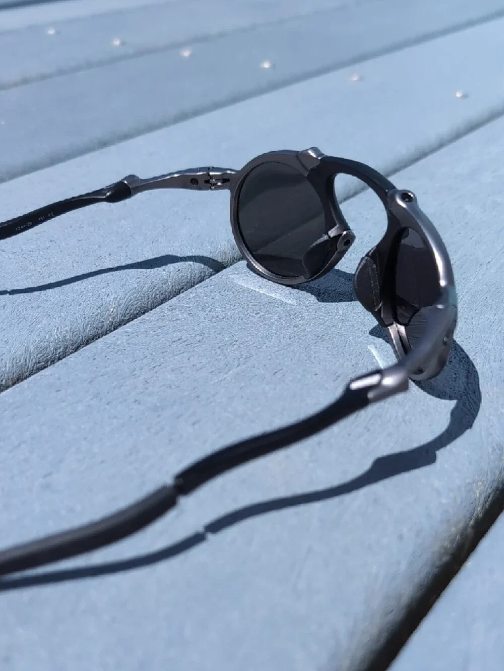Oakley Madman Round Metal Black Silver Sunglasses with Polarized Mirrored Lenses